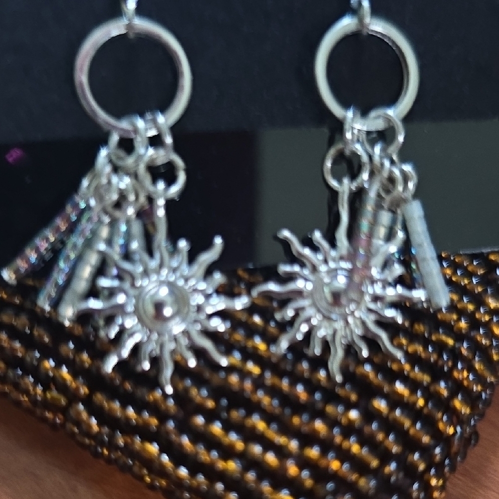 Elegant Silver Sun Charm Earrings - Picture 3 of 5